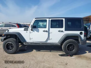 2014 Jeep Wrangler Unlimited Sport with VIN 1C4BJWDG2EL100591, listed as a IAAI auction lot 41578357 with 155,929 mi miles and . Bid and sale history available at DreamBid. Image 14.