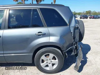 2006 Suzuki Grand Vitara Premium z VIN JS3TD943064100693, wystawiony jako IAAI lot #41772479 z przebiegiem 135 901 mil mil oraz . Historia ofert i sprzedaży dostępna na DreamBid. Obrazek 6.