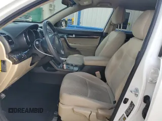 2012 Kia Sorento LX with VIN 5XYKT3A19CG219658, listed as a Copart auction lot 54078185 with 102,699 mi miles and Salvage Title. Bid and sale history available at DreamBid. Image 7.
