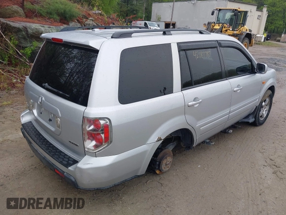 2006 Honda Pilot EX-L with VIN 2HKYF18606H513308, listed as a IAAI auction lot 42187787 with 185,716 mi miles and . Bid and sale history available at DreamBid. Image 4.