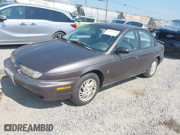 1999 Saturn SL with VIN 1G8ZK5272XZ225139, listed as a IAAI auction lot 42662628 with 223,692 mi miles and . Bid and sale history available at DreamBid. Image 2.