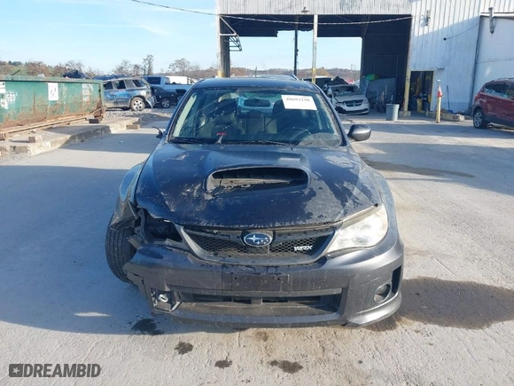 2013 Subaru Impreza Wagon WRX WRX with VIN JF1GR7E64DG201476, listed as a IAAI auction lot 40693198 with 137,959 mi miles. Bid and sale history available at carsss.com. Image 12.