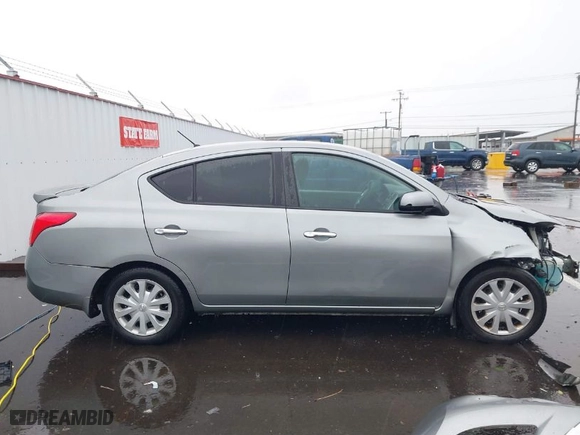 2014 Nissan Versa S with VIN 3N1CN7AP1EK462041, listed as a IAAI auction lot 41640390 with 148,241 mi miles. Bid and sale history available at carsss.com. Image 14.