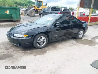 2001 Pontiac Grand Prix GTP z VIN 1G2WR12161F224789, wystawiony jako IAAI lot #42274536 z przebiegiem 125 098 mil mil oraz . Historia ofert i sprzedaży dostępna na DreamBid. Obrazek 2.