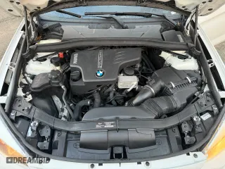 2013 BMW X1 28i with VIN WBAVM1C54DVW42766, listed as a Copart auction lot 54416745 with 121,067 mi miles and Clean Title. Bid and sale history available at carsss.com. Image 7.