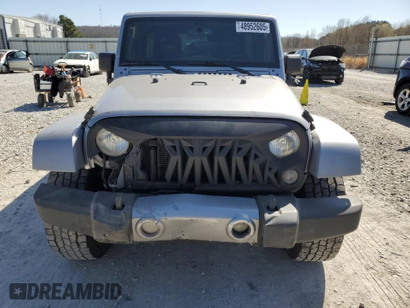 2016 Jeep Wrangler Unlimited 75th Anniversary with VIN 1C4BJWEG3GL265518, listed as a Copart auction lot 48952605 with 77,783 mi miles and Salvage title. Bid and sale history available at DreamBid. Image 5.