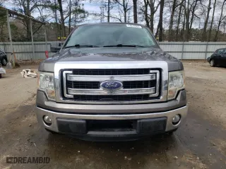2013 Ford F-150 XL with VIN 1FTFW1CF6DKE99055, listed as a Copart auction lot 47014585 with 169,115 mi miles and Salvage Title. Bid and sale history available at carsss.com. Image 5.