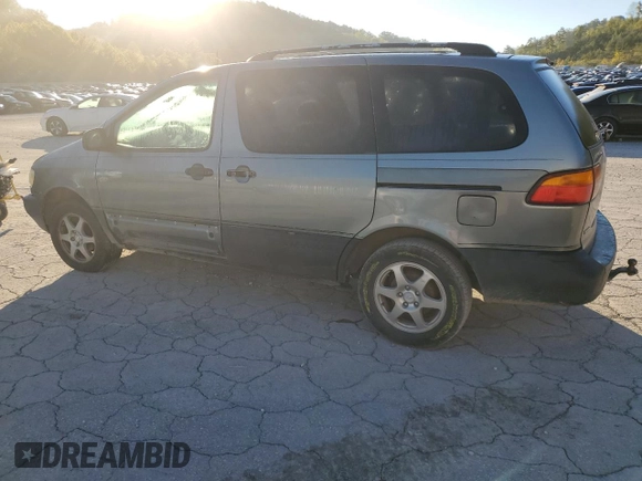1999 Toyota Sienna LE with VIN 4T3ZF13C4XU137126, listed as a Copart auction lot 75205074 with 0 mi miles and Salvage Title. Bid and sale history available at carsss.com. Image 2.