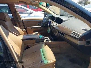 2006 BMW 7 Series 750Li z VIN WBAHN83526DT63490, wystawiony jako IAAI lot #42624790 z przebiegiem 146 508 mil mil oraz . Historia ofert i sprzedaży dostępna na DreamBid. Obrazek 5.