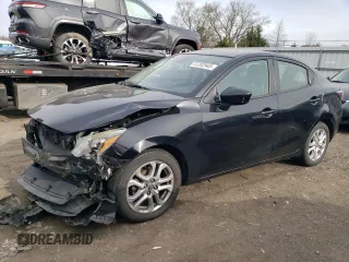2016 Scion iA z VIN 3MYDLBZV5GY138671, wystawiony jako Copart lot #51202945 z przebiegiem 73 125 mil mil oraz Szkoda całkowita • Salvage title. Historia ofert i sprzedaży dostępna na DreamBid. Obrazek 1.