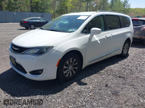 2017 Chrysler Pacifica Touring L with VIN 2C4RC1BG0HR821230, listed as a IAAI auction lot 42158120 with 98,354 mi miles and . Bid and sale history available at DreamBid. Image 17.