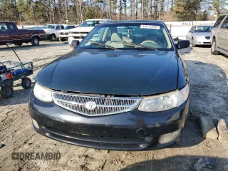 1999 Toyota Solara SE with VIN 2T1CG22P2XC231495, listed as a Copart auction lot 85018294 with 229,607 mi miles and Salvage Title. Bid and sale history available at DreamBid. Image 5.