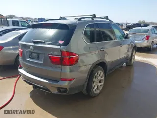 2013 BMW X5 xDrive35i with VIN 5UXZV4C59D0E08690, listed as a IAAI auction lot 41160882 with 109,182 mi miles. Bid and sale history available at carsss.com. Image 4.