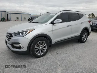 2017 Hyundai Santa Fe 2.0T z VIN 5XYZUDLA3HG413463, wystawiony jako Copart lot #50552885 z przebiegiem 195 657 mil mil oraz Czysty tytuł • Clean title. Historia ofert i sprzedaży dostępna na DreamBid. Obrazek 1.
