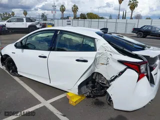 2022 Toyota Prius L Eco with VIN JTDKAMFU5N3174854, listed as a IAAI auction lot 41816230 with 93,444 mi miles. Bid and sale history available at carsss.com. Image 6.