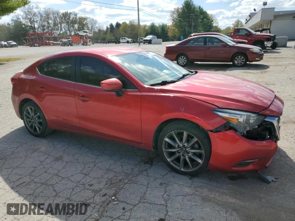 2018 Mazda 3 Touring with VIN 3MZBN1V37JM211629, listed as a Copart auction lot 76329334 with 137,349 mi miles and Salvage Title. Bid and sale history available at DreamBid. Image 4.
