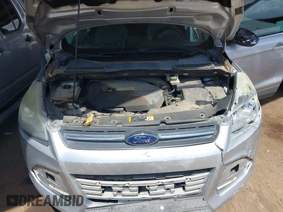2013 Ford Escape SE with VIN 1FMCU0GX9DUB83512, listed as a IAAI auction lot 41970256 with 69,897 mi miles and . Bid and sale history available at DreamBid. Image 10.