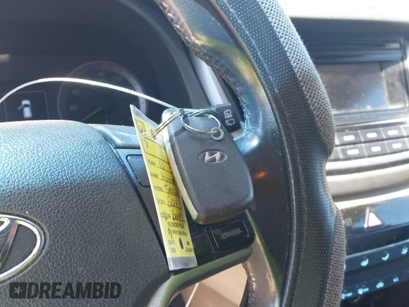 2016 Hyundai Tucson Sport with VIN KM8J33A29GU054909, listed as a IAAI auction lot 41835688 with 90,751 mi miles. Bid and sale history available at carsss.com. Image 11.