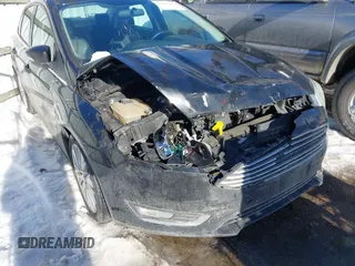 2015 Ford Focus Titanium with VIN 1FADP3J22FL323185, listed as a IAAI auction lot 41461154 with 125,477 mi miles and . Bid and sale history available at carsss.com. Image 6.