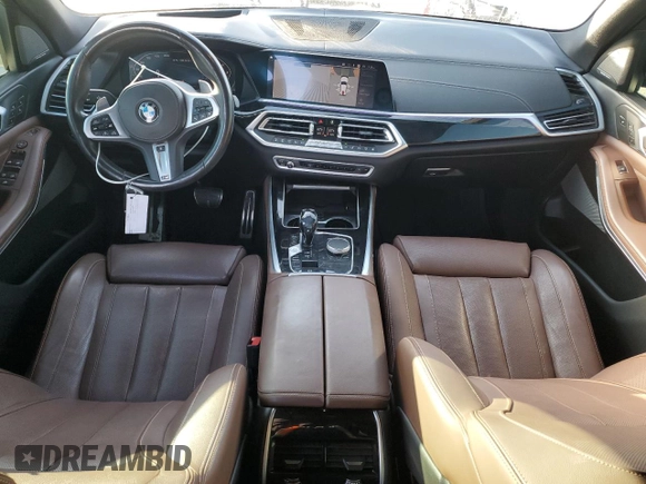 2020 BMW X5 M50i with VIN 5UXJU4C01LLE45993, listed as a Copart auction lot 88904235 with 64,841 mi miles and Salvage Title. Bid and sale history available at DreamBid. Image 8.