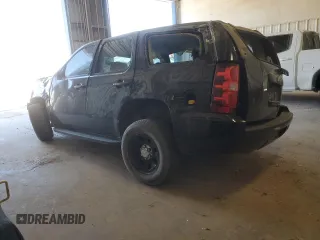 2013 Chevrolet Tahoe Commercial with VIN 1GNLC2E01DR190568, listed as a Copart auction lot 49525875 with 87,872 mi miles and Salvage title. Bid and sale history available at DreamBid. Image 2.
