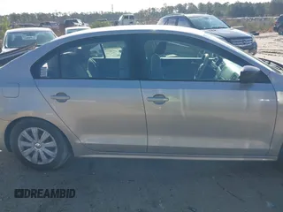 2014 Volkswagen Jetta S with VIN 3VW2K7AJ3EM207910, listed as a IAAI auction lot 41759225 with 179,341 mi miles and . Bid and sale history available at DreamBid. Image 13.