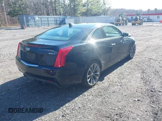 2016 Cadillac ATS Luxury Collection RWD z VIN 1G6AB1RX9G0194349, wystawiony jako IAAI lot #41882442 z przebiegiem 52 676 mil mil oraz . Historia ofert i sprzedaży dostępna na DreamBid. Obrazek 4.