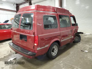 1992 GMC Safari z VIN 1GDEL19W2NB539396, wystawiony jako Copart lot #79221434 z przebiegiem 99 406 mil mil oraz Nie do naprawy. Historia ofert i sprzedaży dostępna na DreamBid. Obrazek 3.