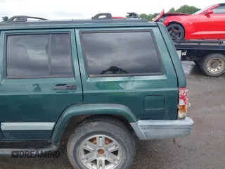 2000 Jeep Cherokee with VIN 1J4FT48S4YL240347, listed as a IAAI auction lot 42361311 with Not provided miles and . Bid and sale history available at DreamBid. Image 14.