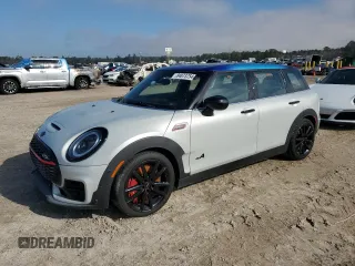 2023 MINI Clubman John Cooper Works with VIN WMWJZ9C06P2S78410, listed as a Copart auction lot 84873754 with 0 mi miles and Non Repairable. Bid and sale history available at carsss.com. Image 1.