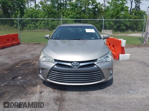 2016 Toyota Camry XLE with VIN 4T1BF1FKXGU259860, listed as a IAAI auction lot 42219507 with 239,145 mi miles and . Bid and sale history available at DreamBid. Image 12.