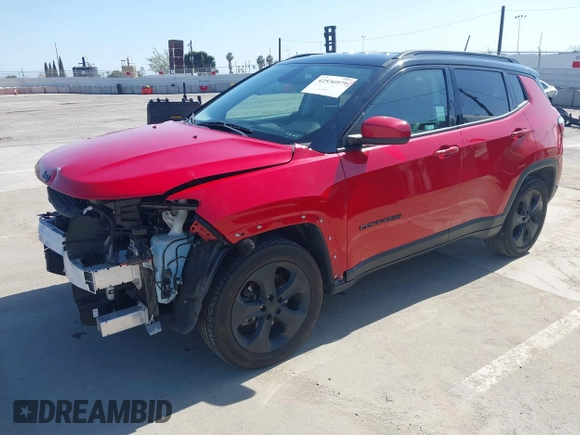 2021 Jeep Compass Altitude with VIN 3C4NJCBB3MT560039, listed as a IAAI auction lot 42536979 with 30,357 mi miles and . Bid and sale history available at DreamBid. Image 2.