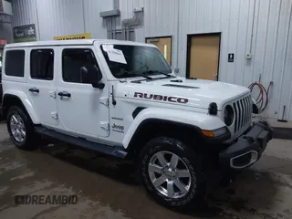 2018 Jeep Wrangler Unlimited Sahara z VIN 1C4HJXEG3JW117990, wystawiony jako IAAI lot #42290861 z przebiegiem 86 907 mil mil oraz . Historia ofert i sprzedaży dostępna na DreamBid. Obrazek 1.