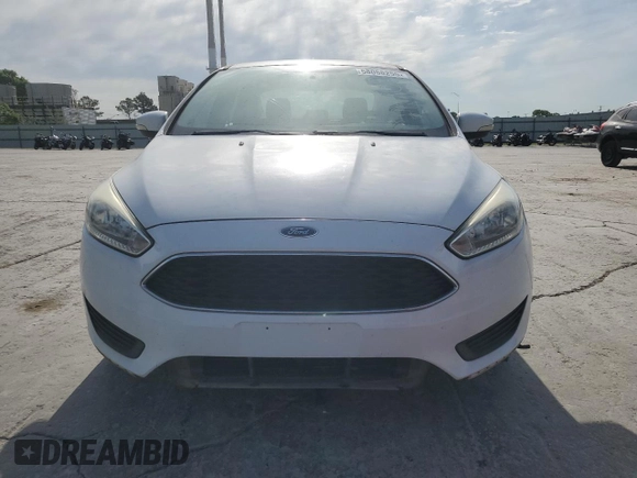 2015 Ford Focus SE with VIN 1FADP3F2XFL220072, listed as a Copart auction lot 58058255 with 128,871 mi miles and Clean title. Bid and sale history available at DreamBid. Image 5.