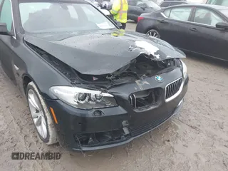 2014 BMW 5 Series 535i xDrive with VIN WBA5B3C56ED537753, listed as a IAAI auction lot 41054663 with 138,684 mi miles and . Bid and sale history available at carsss.com. Image 6.