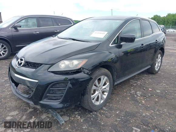 2011 Mazda CX-7 S Touring z VIN JM3ER4CL2B0362415, wystawiony jako IAAI lot #42214144 z przebiegiem 156 976 mil mil oraz . Historia ofert i sprzedaży dostępna na DreamBid. Obrazek 2.