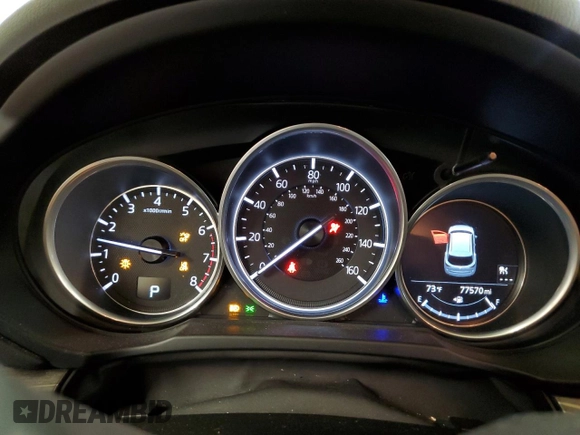 2018 Mazda CX-5 Grand Touring with VIN JM3KFBDM6J0455993, listed as a Copart auction lot 61414275 with 77,570 mi miles and Salvage title. Bid and sale history available at DreamBid. Image 9.