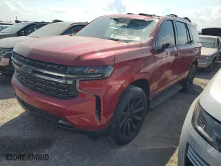 2022 Chevrolet Tahoe RST with VIN 1GNSKRKLXNR128058, listed as a Copart auction lot 76407744 with 0 mi miles and Salvage Title. Bid and sale history available at carsss.com. Image 1.