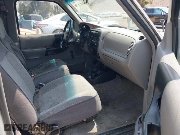 1995 Ford Ranger Splash z VIN 1FTCR14U4SPA34569, wystawiony jako IAAI lot #42418798 z przebiegiem 147 460 mil mil oraz . Historia ofert i sprzedaży dostępna na DreamBid. Obrazek 5.