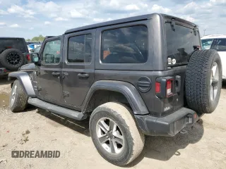 2019 Jeep Wrangler Unlimited Sahara with VIN 1C4HJXENXKW521630, listed as a Copart auction lot 56196145 with 56,753 mi miles and Salvage title. Bid and sale history available at DreamBid. Image 2.