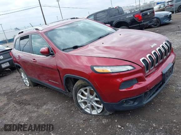 2014 Jeep Cherokee Latitude with VIN 1C4PJMCS0EW261021, listed as a IAAI auction lot 41986701 with 114,633 mi miles. Bid and sale history available at carsss.com. Image 1.