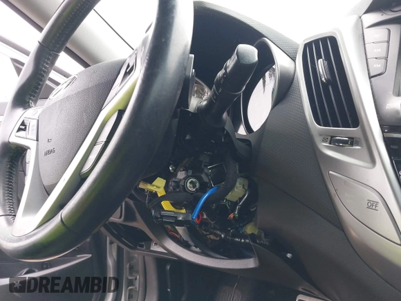 2014 Hyundai Veloster RE:FLEX z VIN KMHTC6AD6EU217282, wystawiony jako IAAI lot #42334268 z przebiegiem 68 473 mil mil oraz . Historia ofert i sprzedaży dostępna na DreamBid. Obrazek 6.