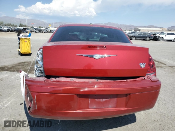 2010 Chrysler 300 with VIN 2C3CA2CV4AH330352, listed as a Copart auction lot 70720414 with 164,673 mi miles and Salvage Title. Bid and sale history available at carsss.com. Image 6.