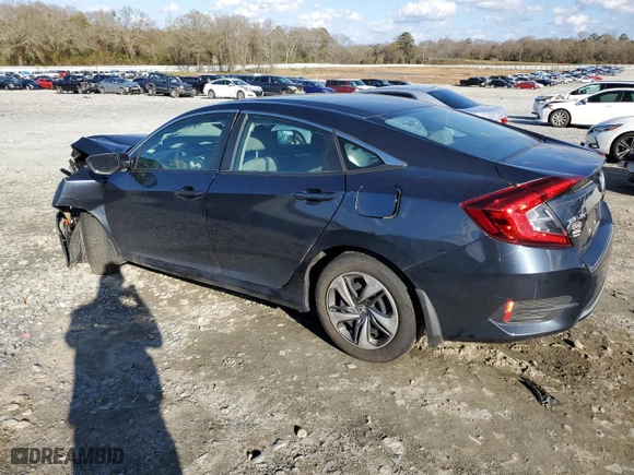 2021 Honda Civic Sedan LX with VIN 2HGFC2F69MH502002, listed as a Copart auction lot 87163124 with 0 mi miles and Salvage Title. Bid and sale history available at carsss.com. Image 2.