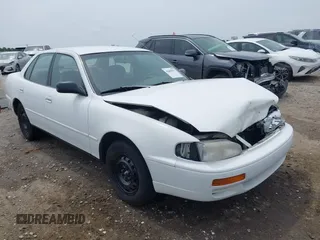 1996 Toyota Camry DX z VIN 4T1BG12K6TU757387, wystawiony jako IAAI lot #42090277 z przebiegiem 153 690 mil mil oraz . Historia ofert i sprzedaży dostępna na DreamBid. Obrazek 1.