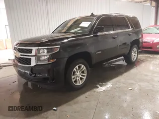 2017 Chevrolet Tahoe LT with VIN 1GNSKBKC6HR299126, listed as a IAAI auction lot 41300644 with 124,821 mi miles and . Bid and sale history available at DreamBid. Image 2.
