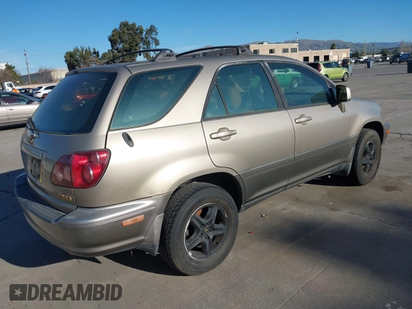 1999 Lexus RX 300 Luxury SUV with VIN JT6HF10UXX0055700, listed as a IAAI auction lot 41330497 with 203,087 mi miles. Bid and sale history available at carsss.com. Image 4.
