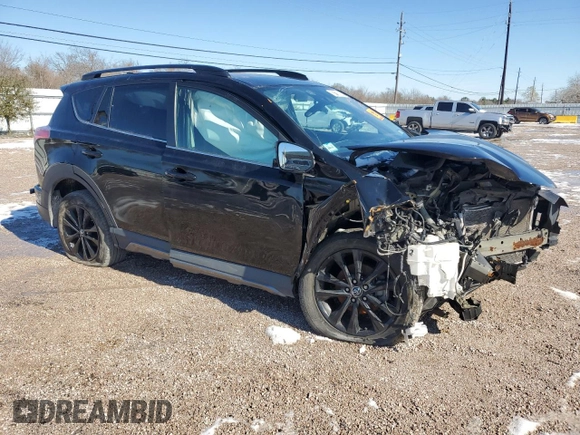 2018 Toyota RAV4 XLE with VIN 2T3RFREV2JW804022, listed as a Copart auction lot 87150944 with Not Provided miles and Salvage Title. Bid and sale history available at DreamBid. Image 4.