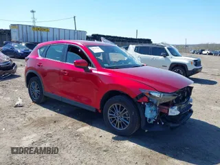 2019 Mazda CX-5 Sport with VIN JM3KFBBM6K1596402, listed as a IAAI auction lot 41971766 with 60,396 mi miles and . Bid and sale history available at carsss.com. Image 1.