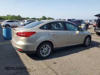 2016 Ford Focus SE with VIN 1FADP3F25GL256592, listed as a Copart auction lot 61739785 with 57,626 mi miles and Salvage title. Bid and sale history available at DreamBid. Image 3.
